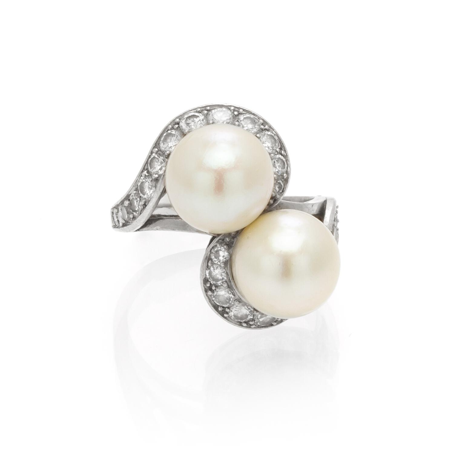 A Platinum, Cultured Pearl and Diamond Toi et Moi Ring, French, 4.90 dwts.