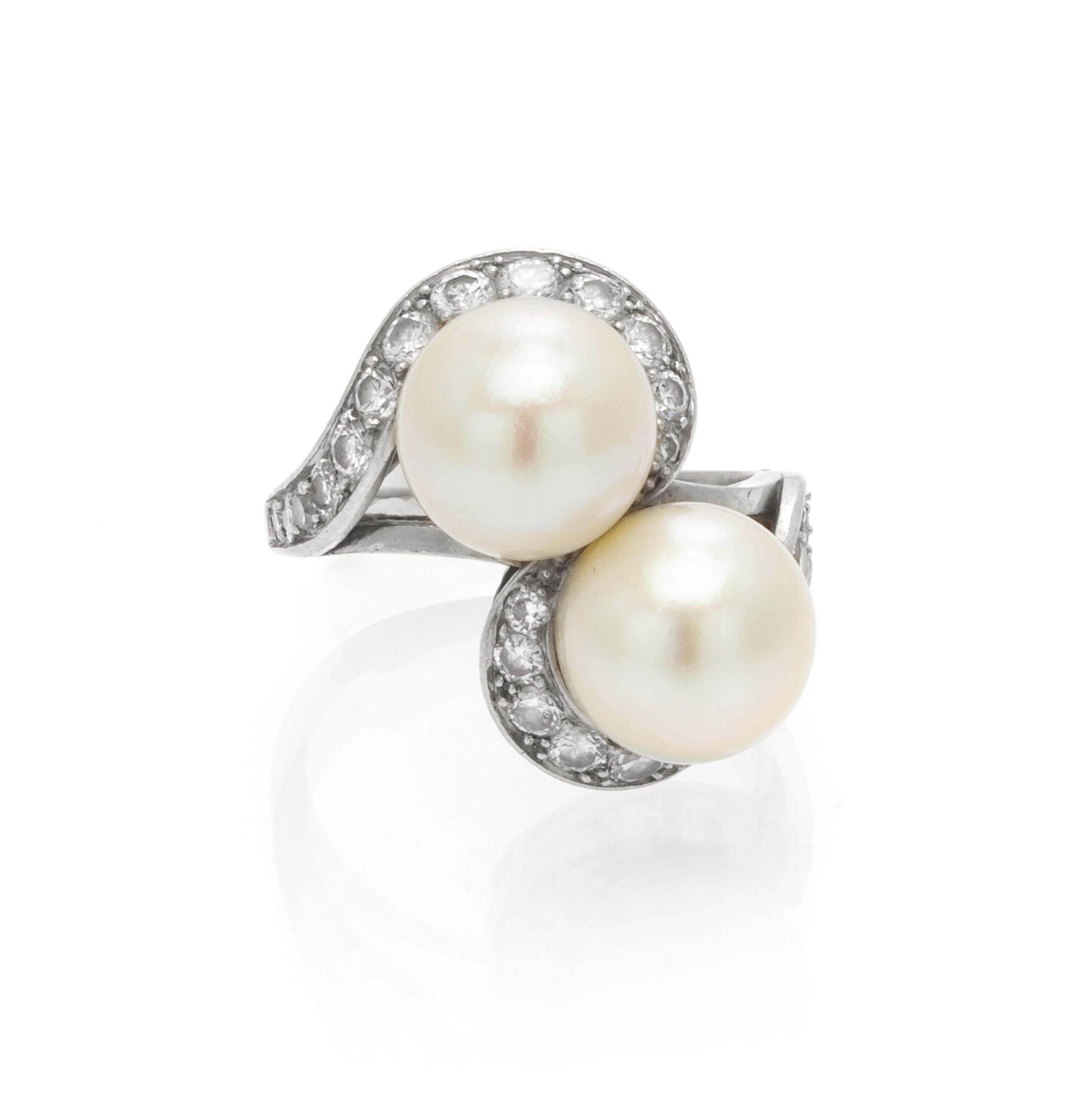 A Platinum, Cultured Pearl and Diamond Toi et Moi Ring, French, 4.90 dwts.