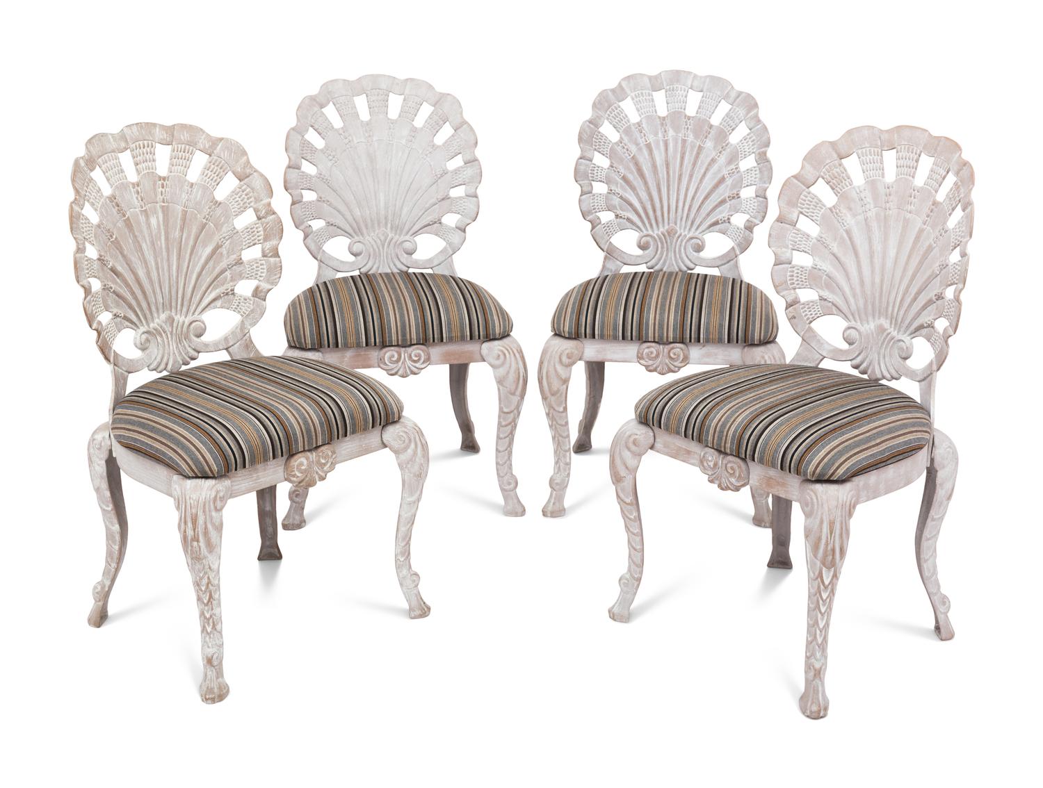 A Set of Four "Grotto" Style Cast Metal Chairs