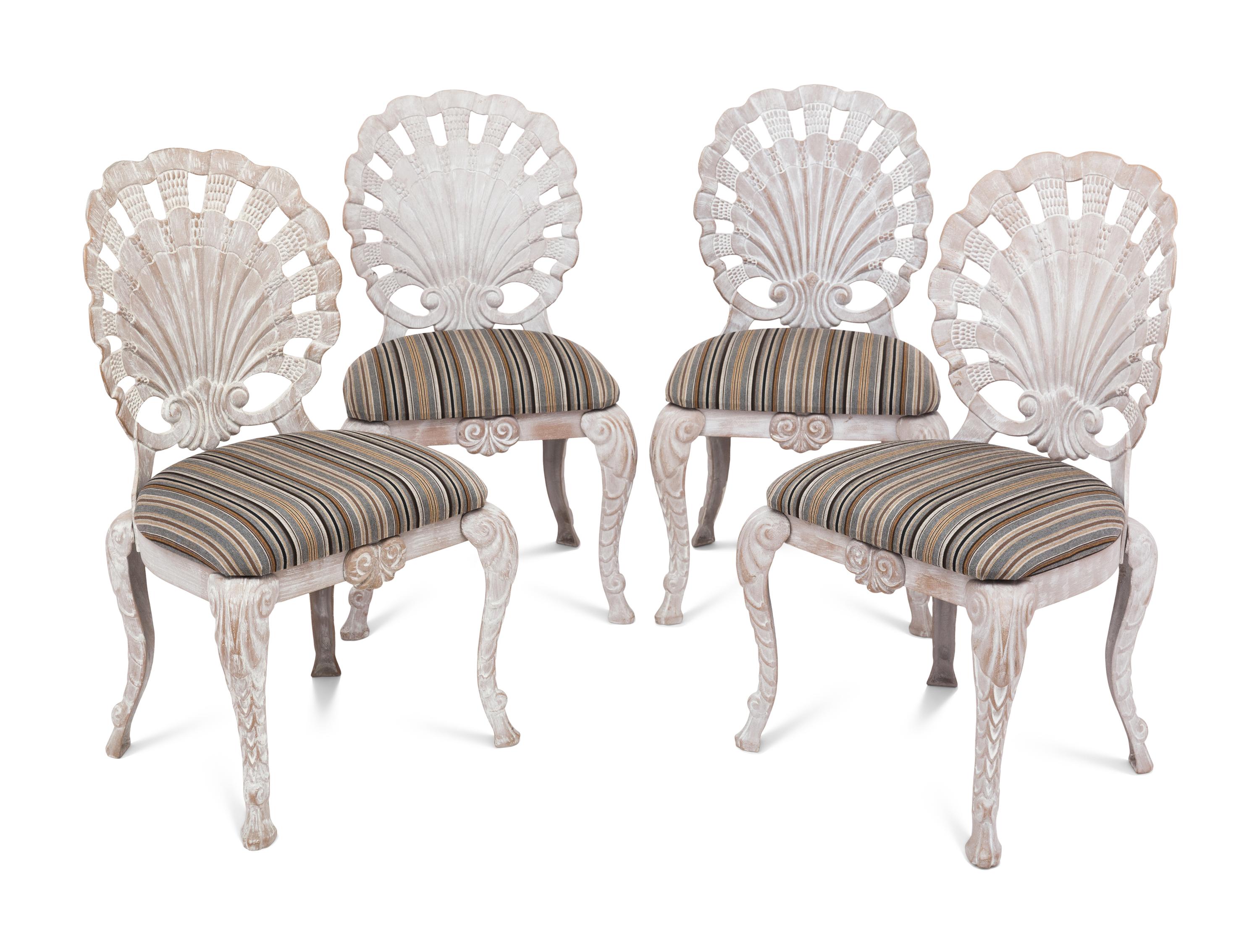 A Set of Four "Grotto" Style Cast Metal Chairs