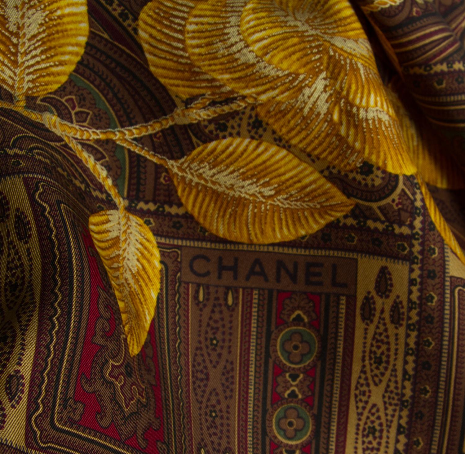 A Chanel Silk Scarf, 38" x 38".