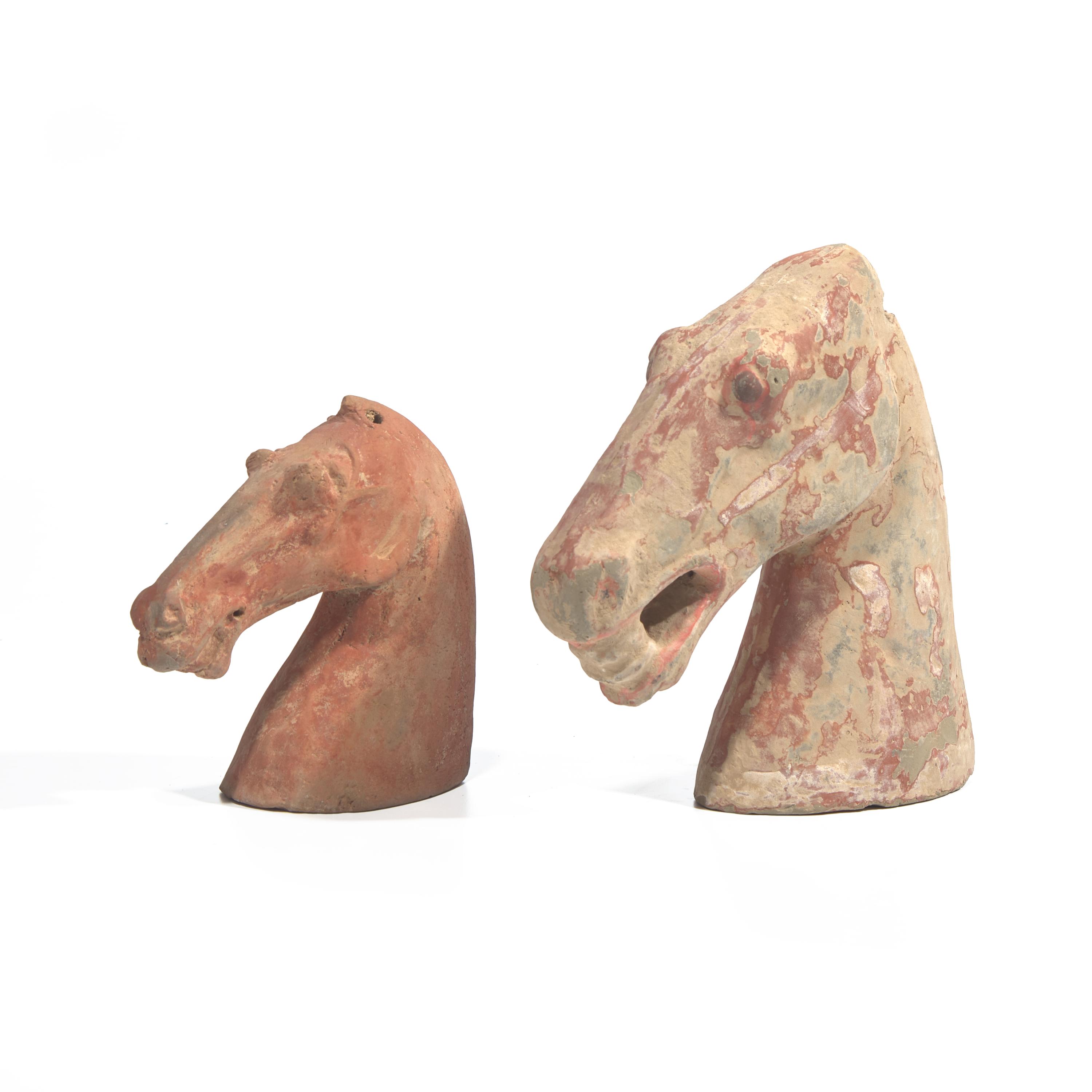 Two Chinese Painted Pottery Heads of Horses, Han Dynasty — 漢 紅陶馬頭兩件