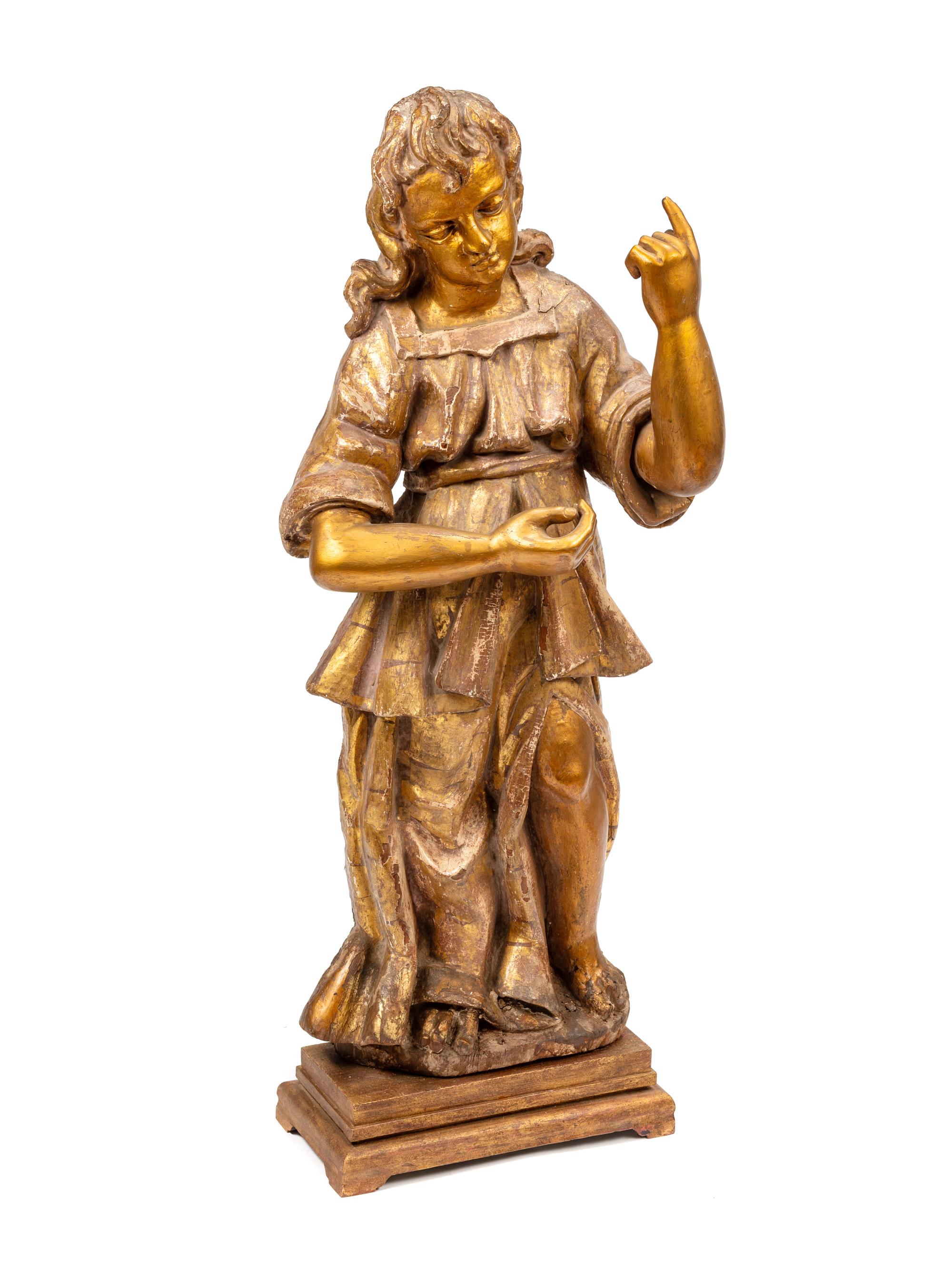 An Italian Carved and Parcel Gilt Saint Figure