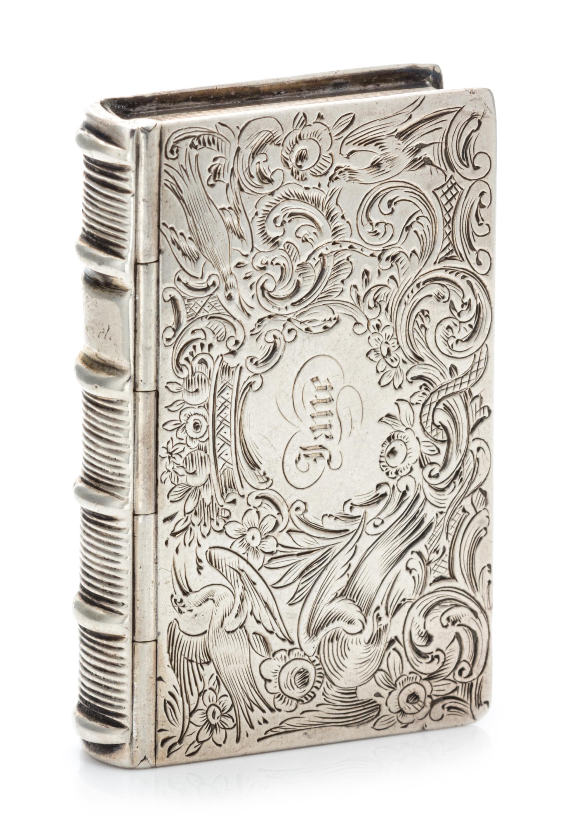 A Silver Vinaigrette, With spurious Georgian marks, in the form of a book, the case having ornithological, floral and foliate decoratio