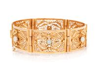 A 14 Karat Rose Gold and Opal Bracelet,