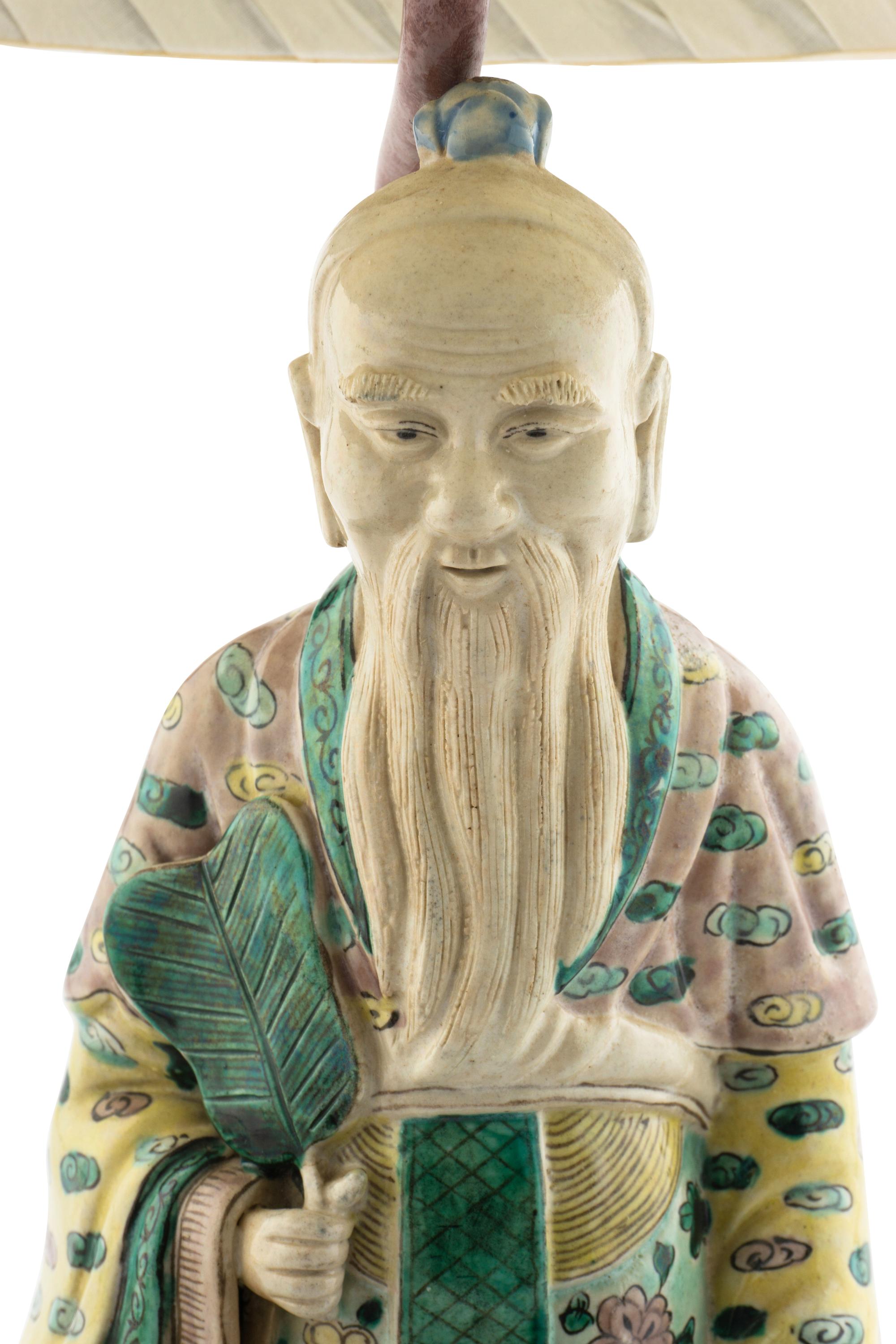 A Chinese Porcelain Figure of an Immortal