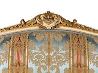 A Louis XV Style Cream Painted and Parcel Gilt Canapé