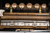A Swiss Burlwood "Bells-in-Sight" Cylinder Music Box