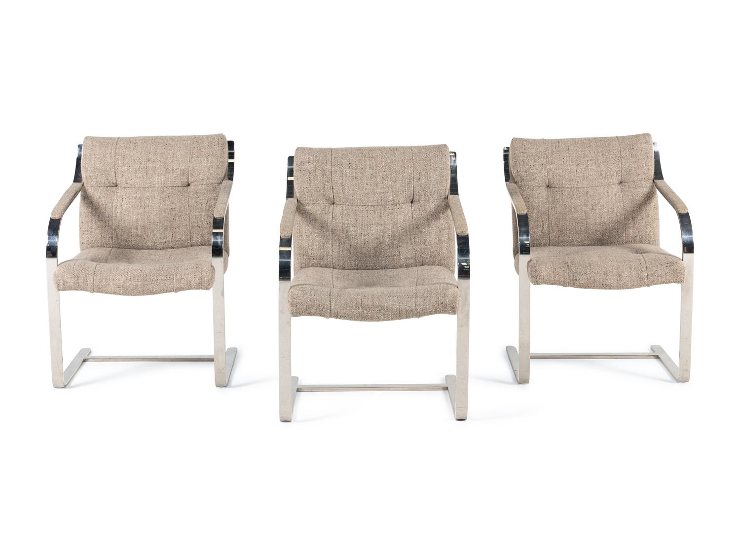 Three Cantilevered Dining Chairs