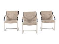 Three Cantilevered Dining Chairs