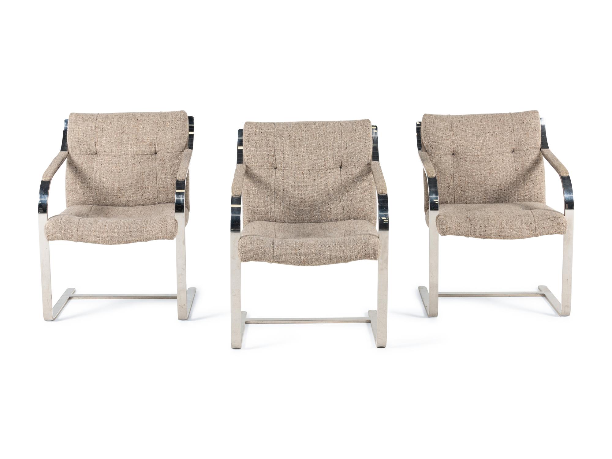 Three Cantilevered Dining Chairs