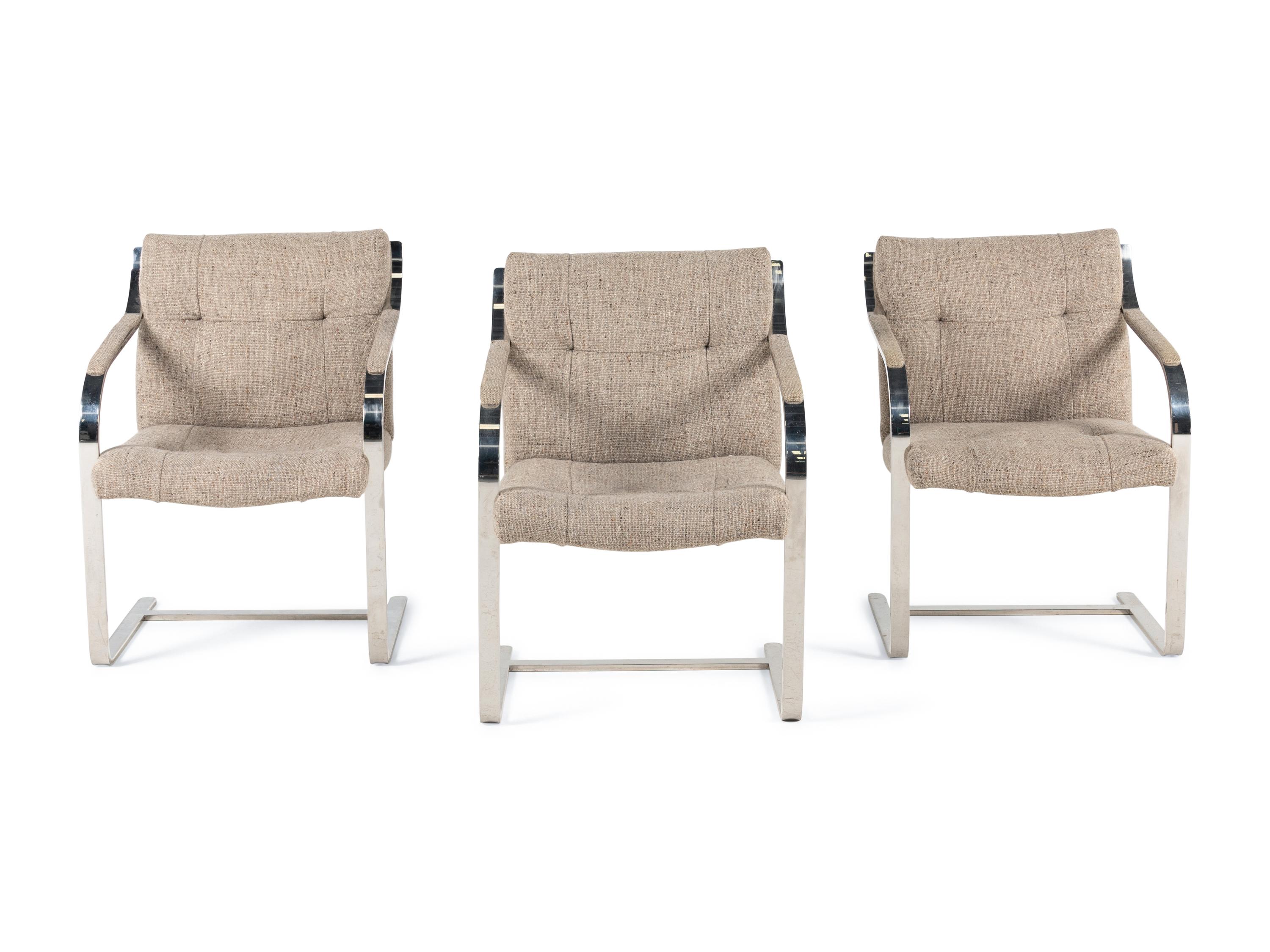 Three Cantilevered Dining Chairs