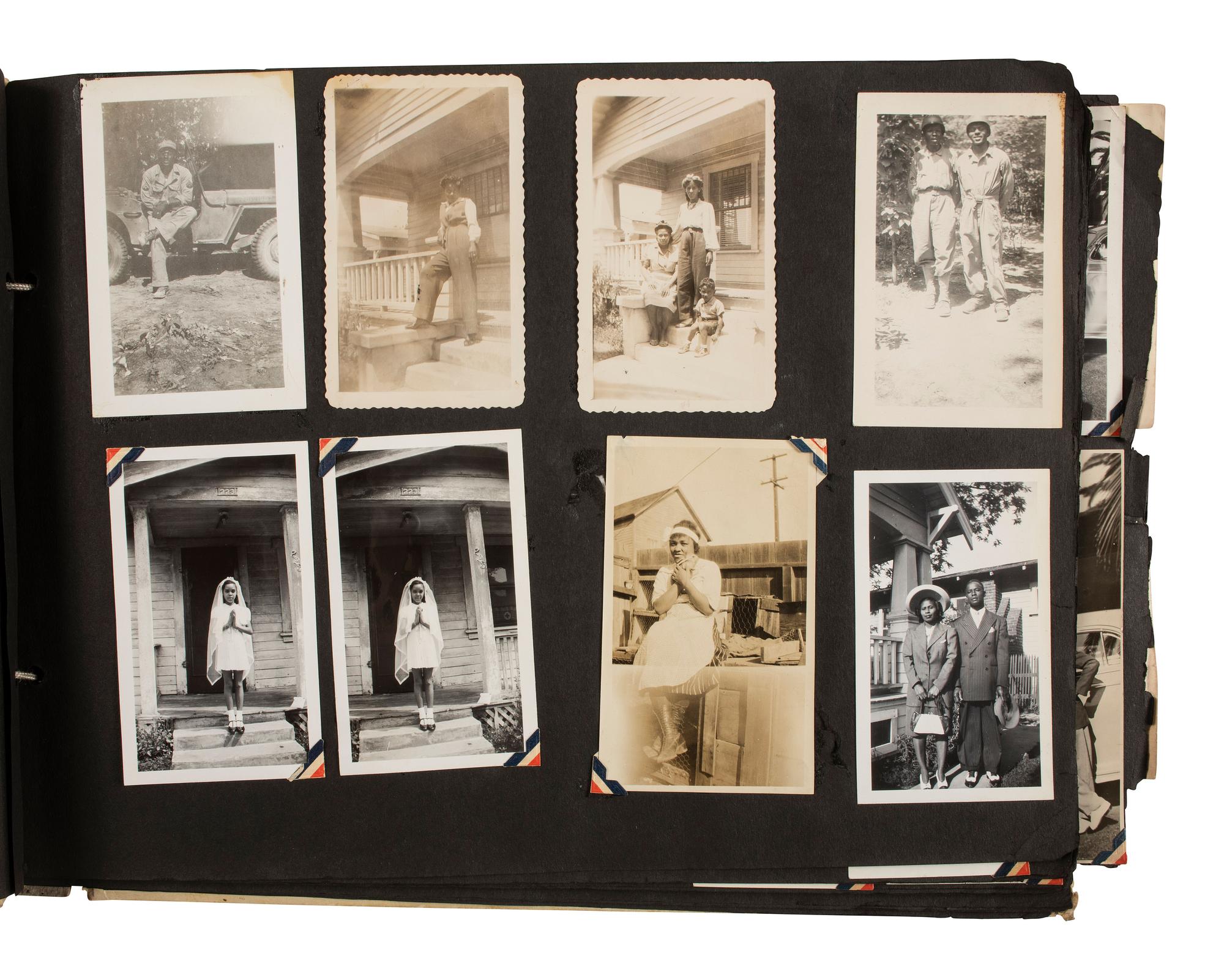 [AFRICAN AMERICANA - EARLY PHOTOGRAPHY]. A group of 2 albums containing photographs of African American families, including snapshots of civilians and soldiers. Ca 1930s-1940s.