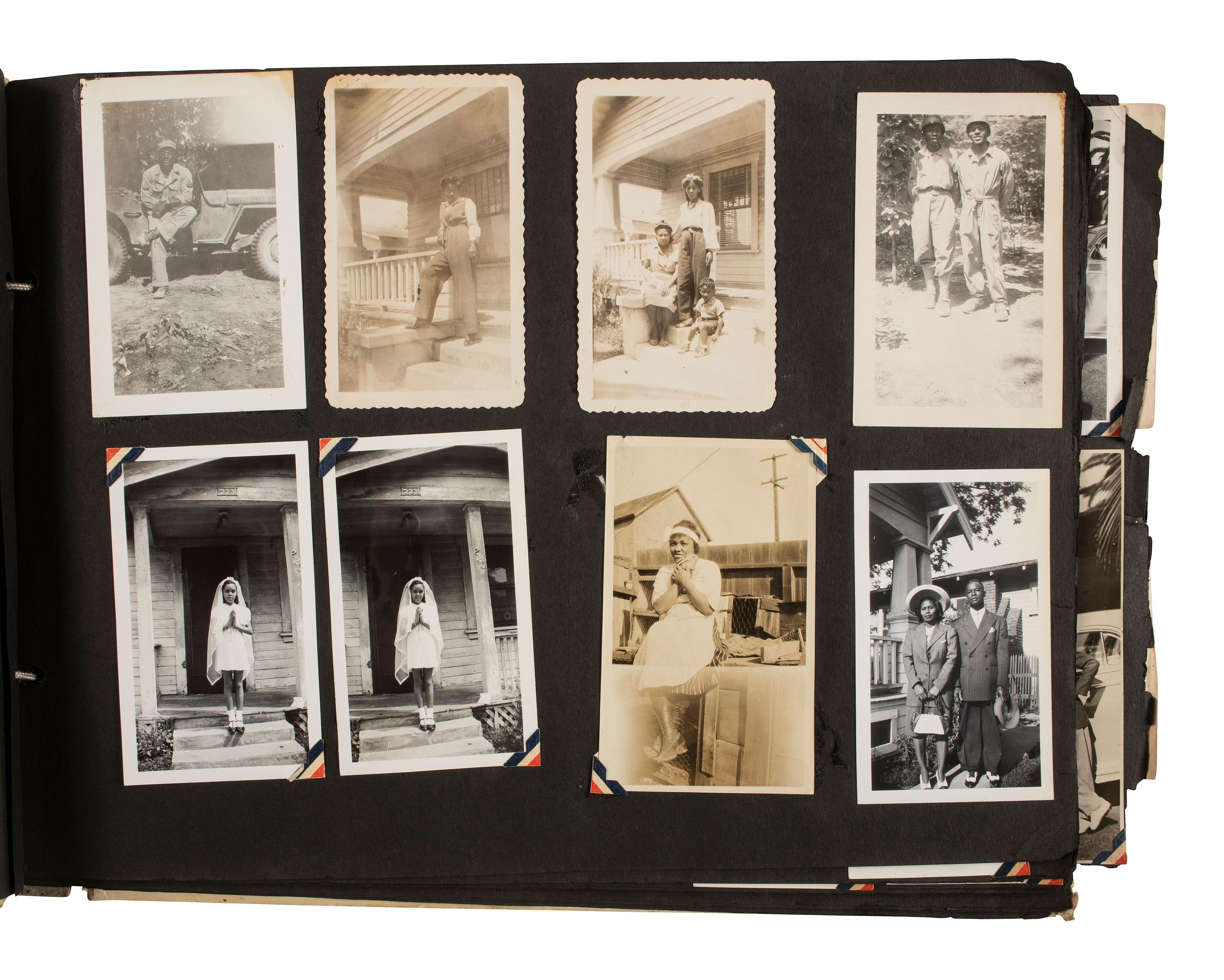 [AFRICAN AMERICANA - EARLY PHOTOGRAPHY]. A group of 2 albums containing photographs of African American families, including snapshots of civilians and soldiers. Ca 1930s-1940s.