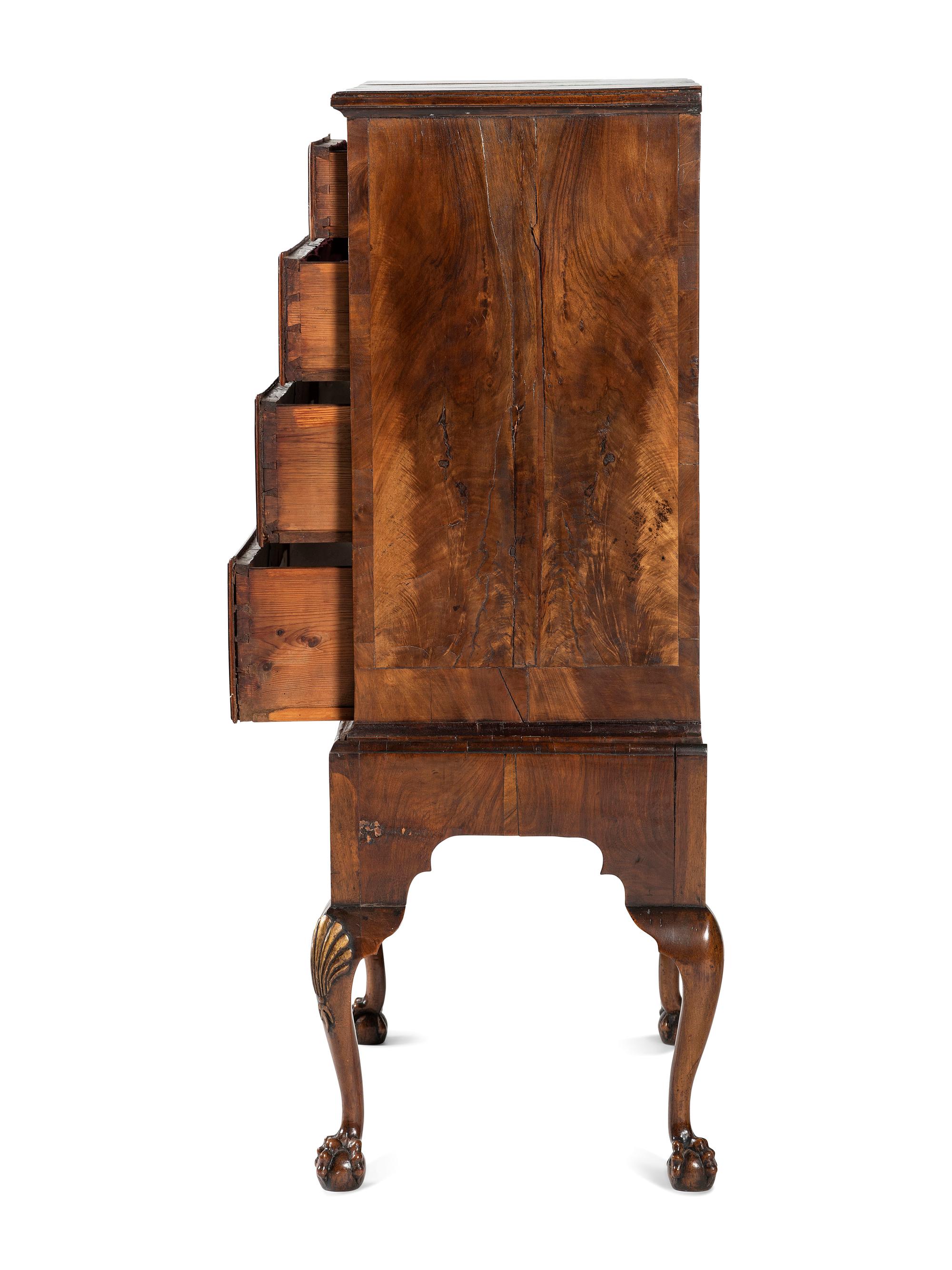A George II Shell-Carved and Parcel Gilt Walnut-Veneered Chest-on-Stand
