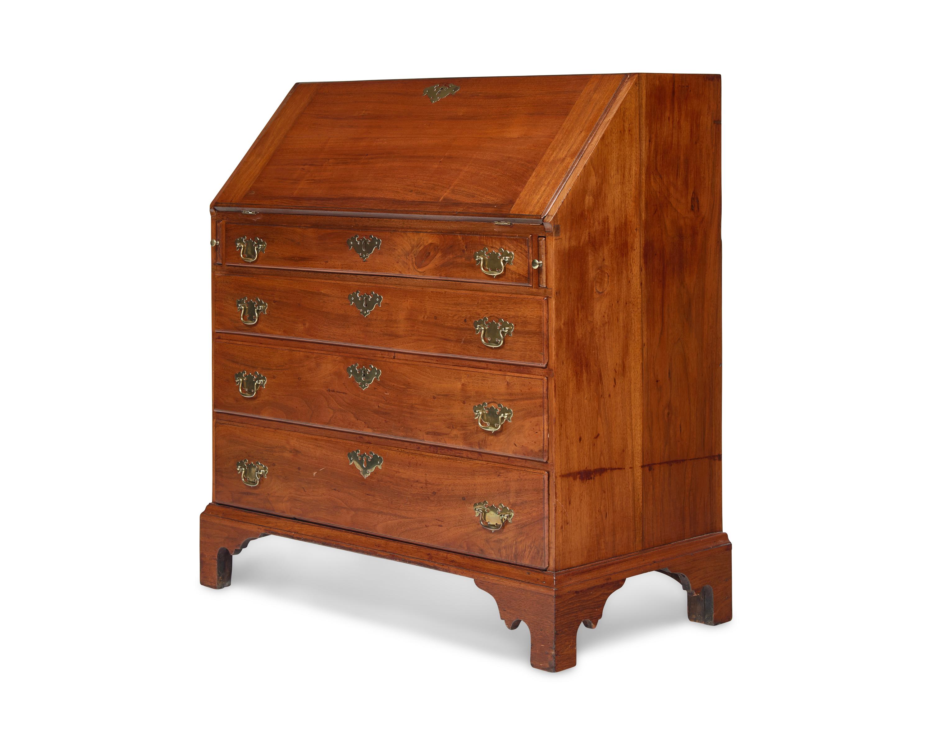 A Chippendale Walnut Slant-Front Desk