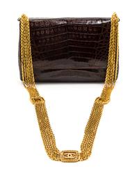 A Chanel Brown Exotic Skin Leather Bag, 8 x 5 x 3 inches.