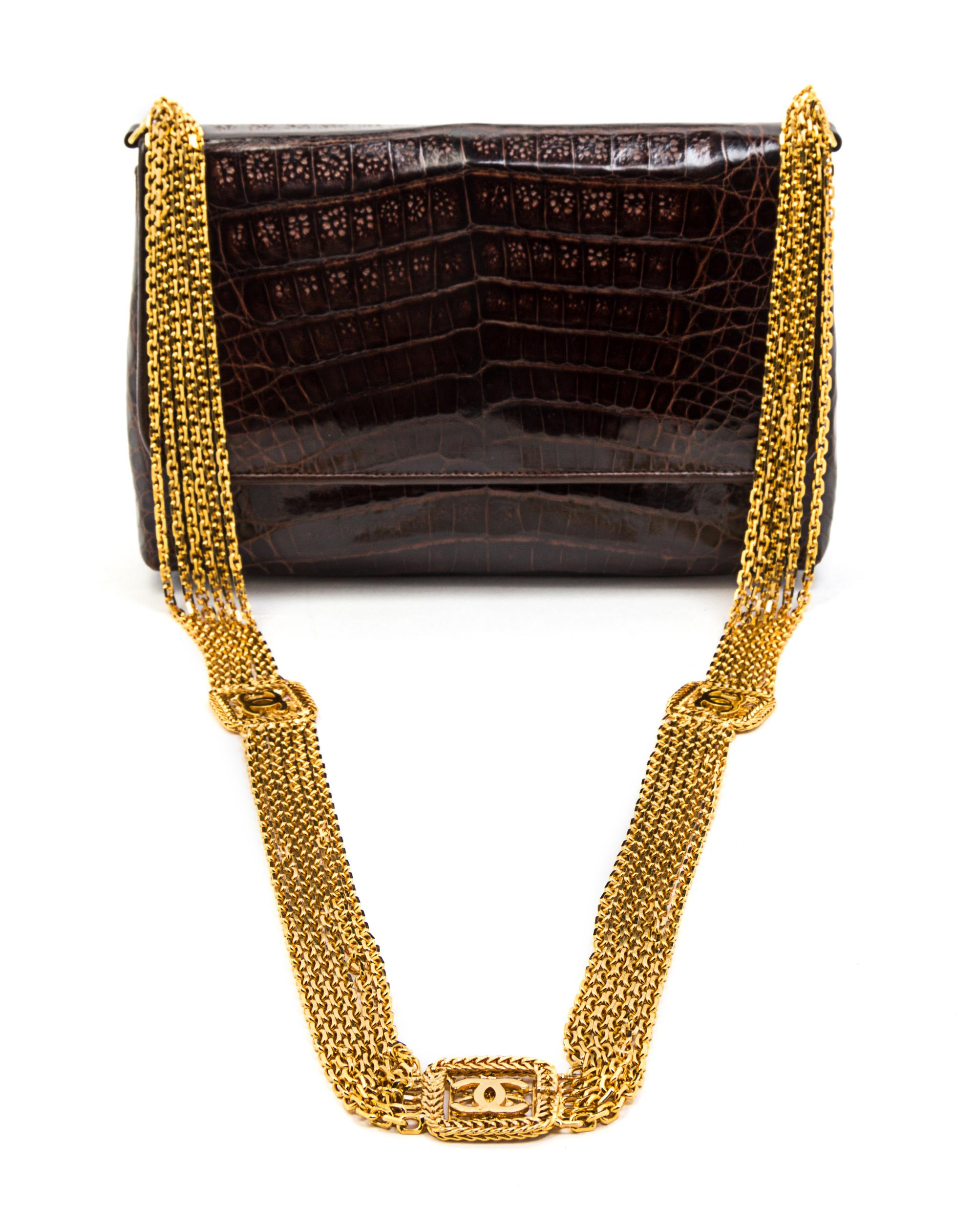 A Chanel Brown Exotic Skin Leather Bag, 8 x 5 x 3 inches.