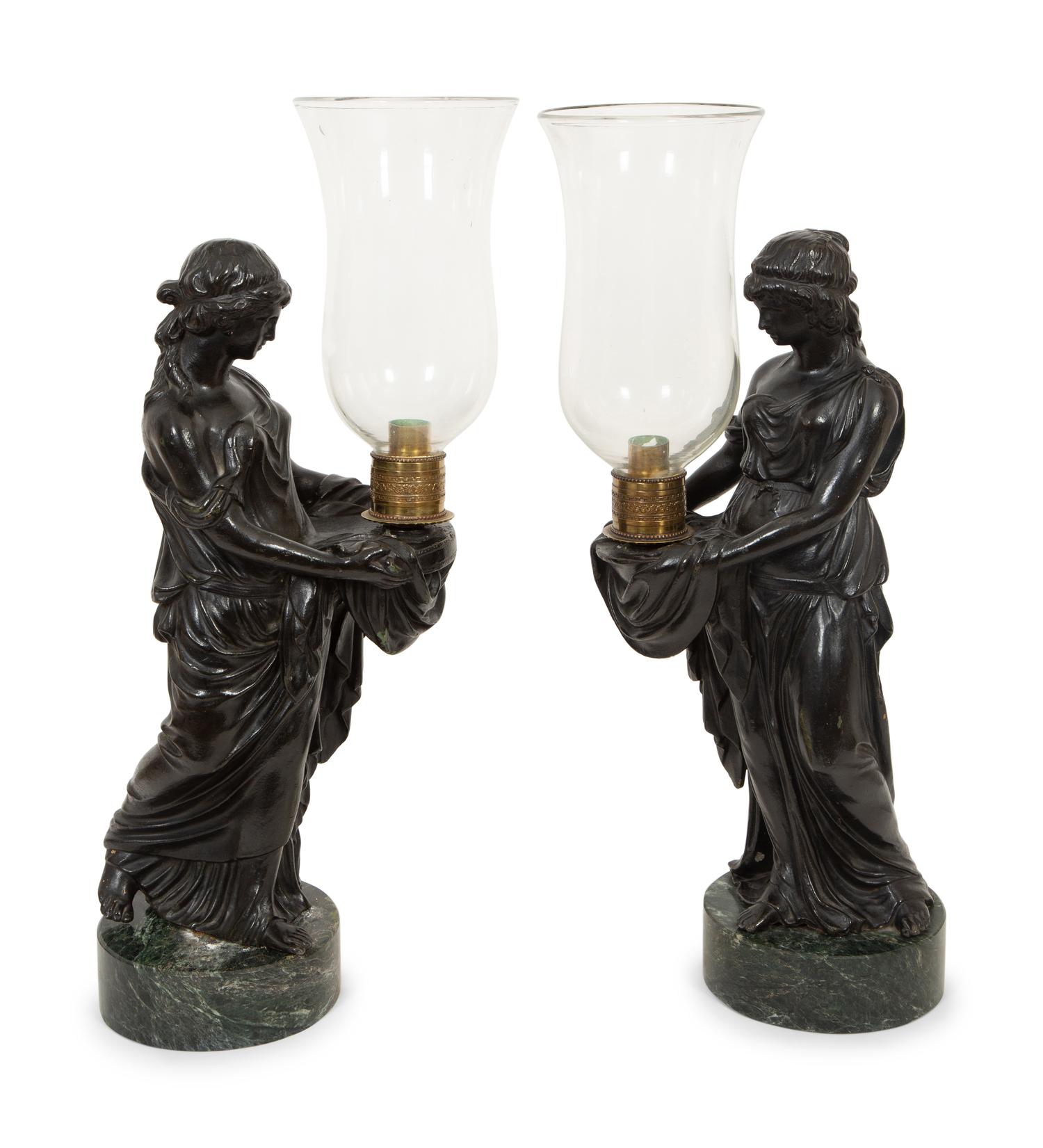A Pair of Figural Hurricane Candlesticks on Verde Antico Marble Bases