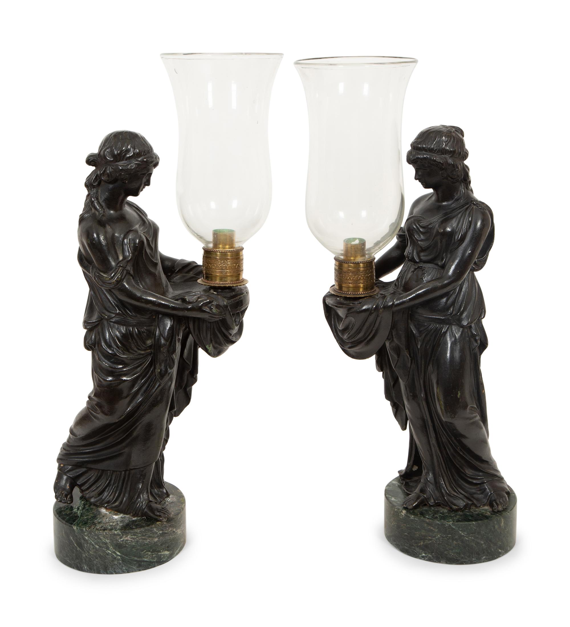 A Pair of Figural Hurricane Candlesticks on Verde Antico Marble Bases