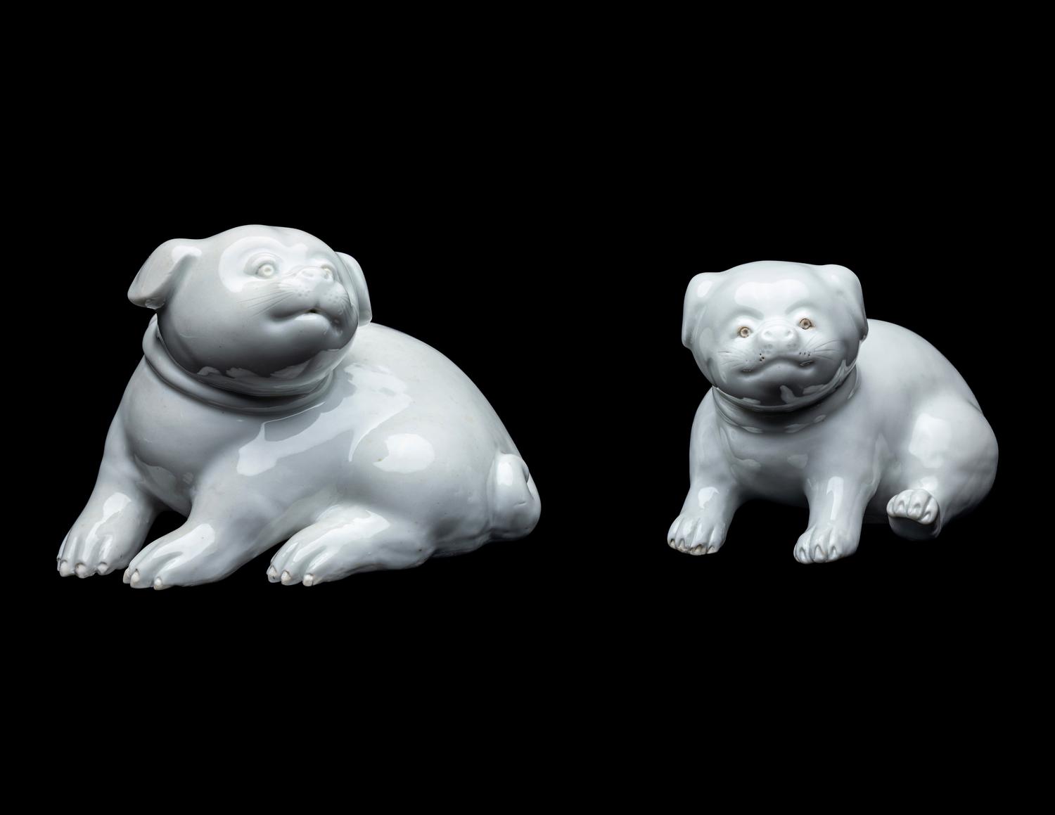A Pair of Japanese Hirado White Glazed Porcelain Figures of Puppies