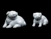 A Pair of Japanese Hirado White Glazed Porcelain Figures of Puppies