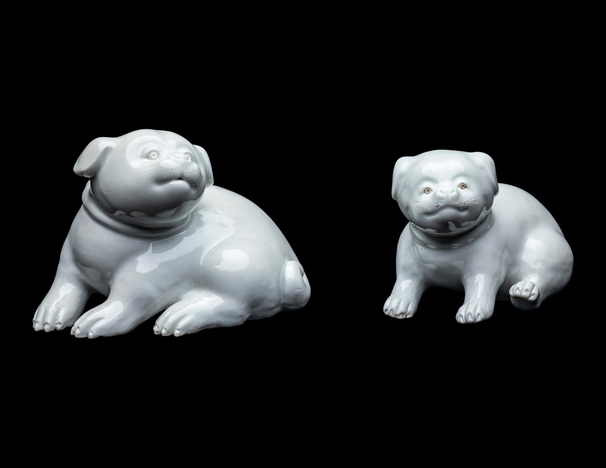 A Pair of Japanese Hirado White Glazed Porcelain Figures of Puppies