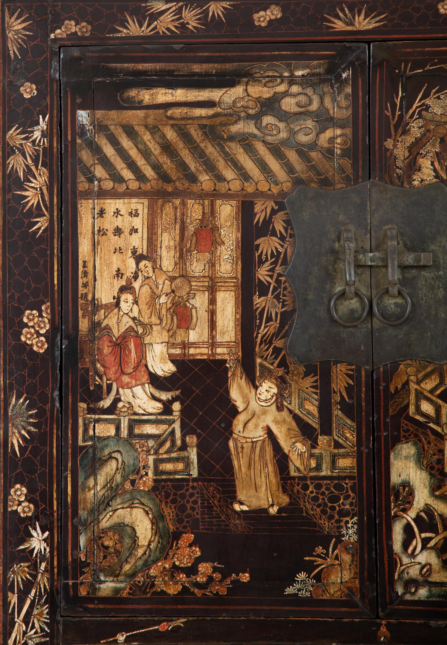 A Chinese Black Lacquer and Polychrome Scholar's Cabinet