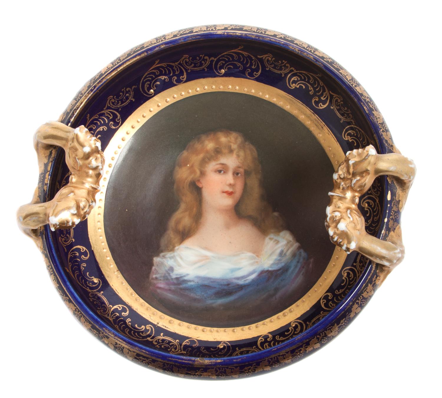 An Italian Cobalt and Parcel Gilt Porcelain Twin-Handled Bowl Diameter 6 1/2 inches.