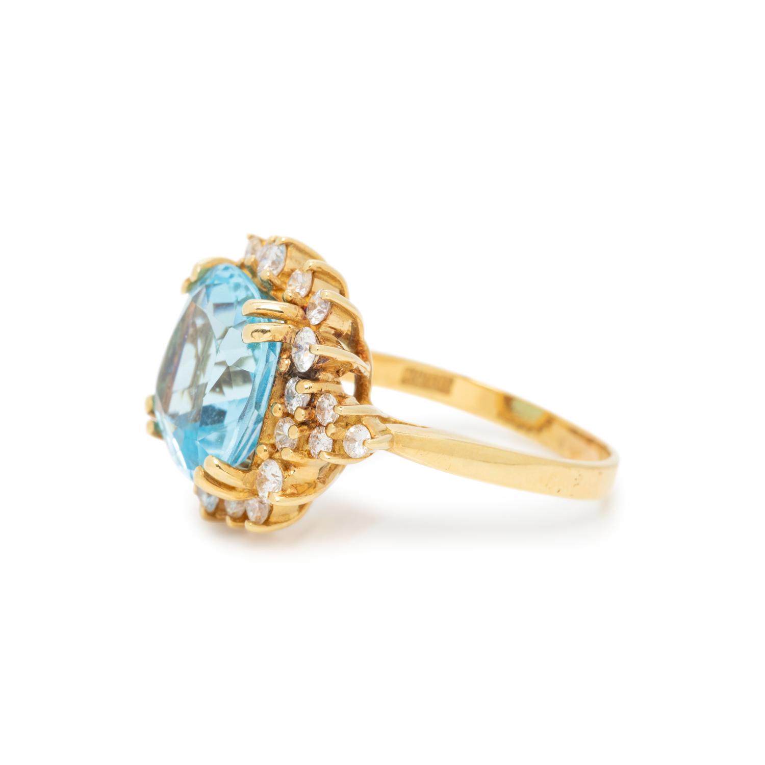 BLUE TOPAZ AND DIAMOND RING