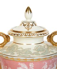 A Pair of Pâte-sur-Pâte Style Porcelain Urns with Gilt Dolphin Handles