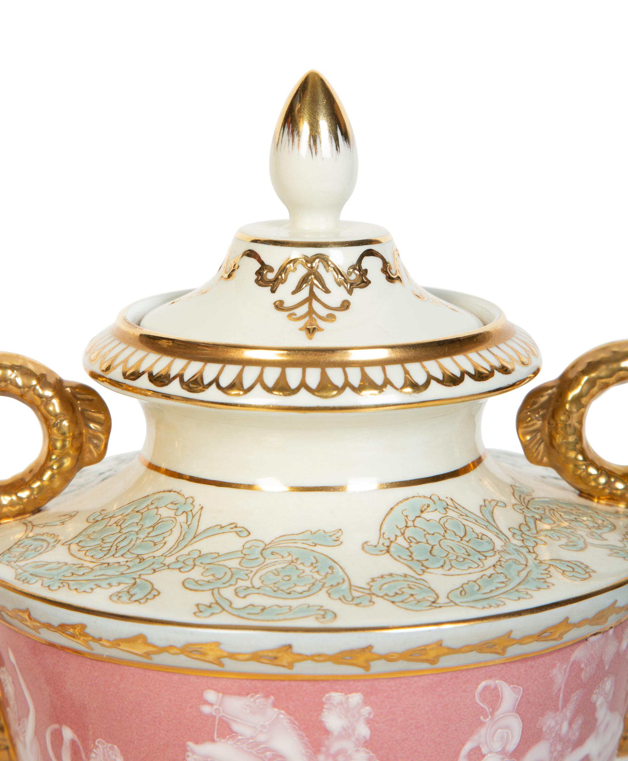 A Pair of Pâte-sur-Pâte Style Porcelain Urns with Gilt Dolphin Handles