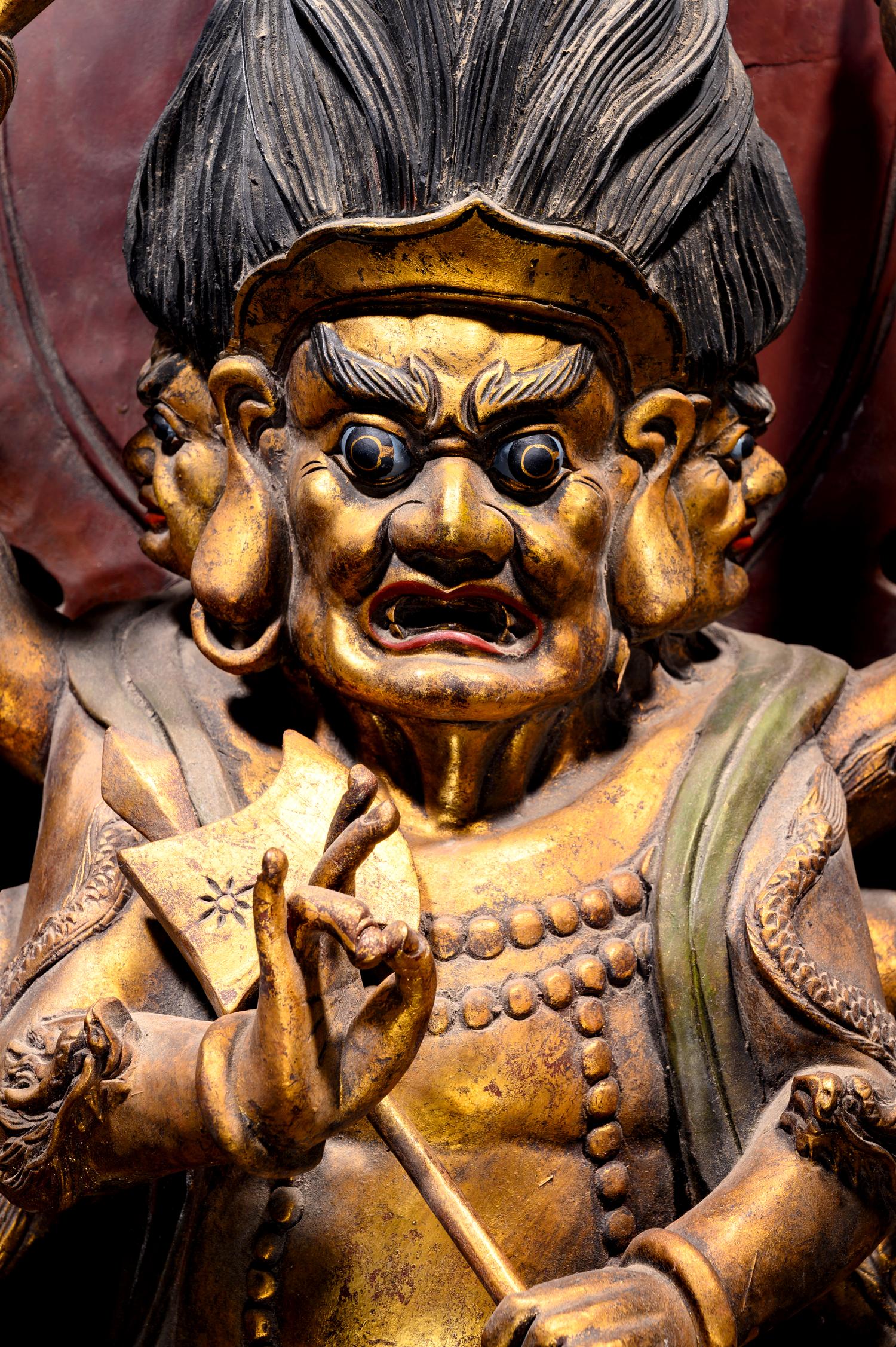 A Large Gilt and Red Lacquered Wood Figure of Mahakala