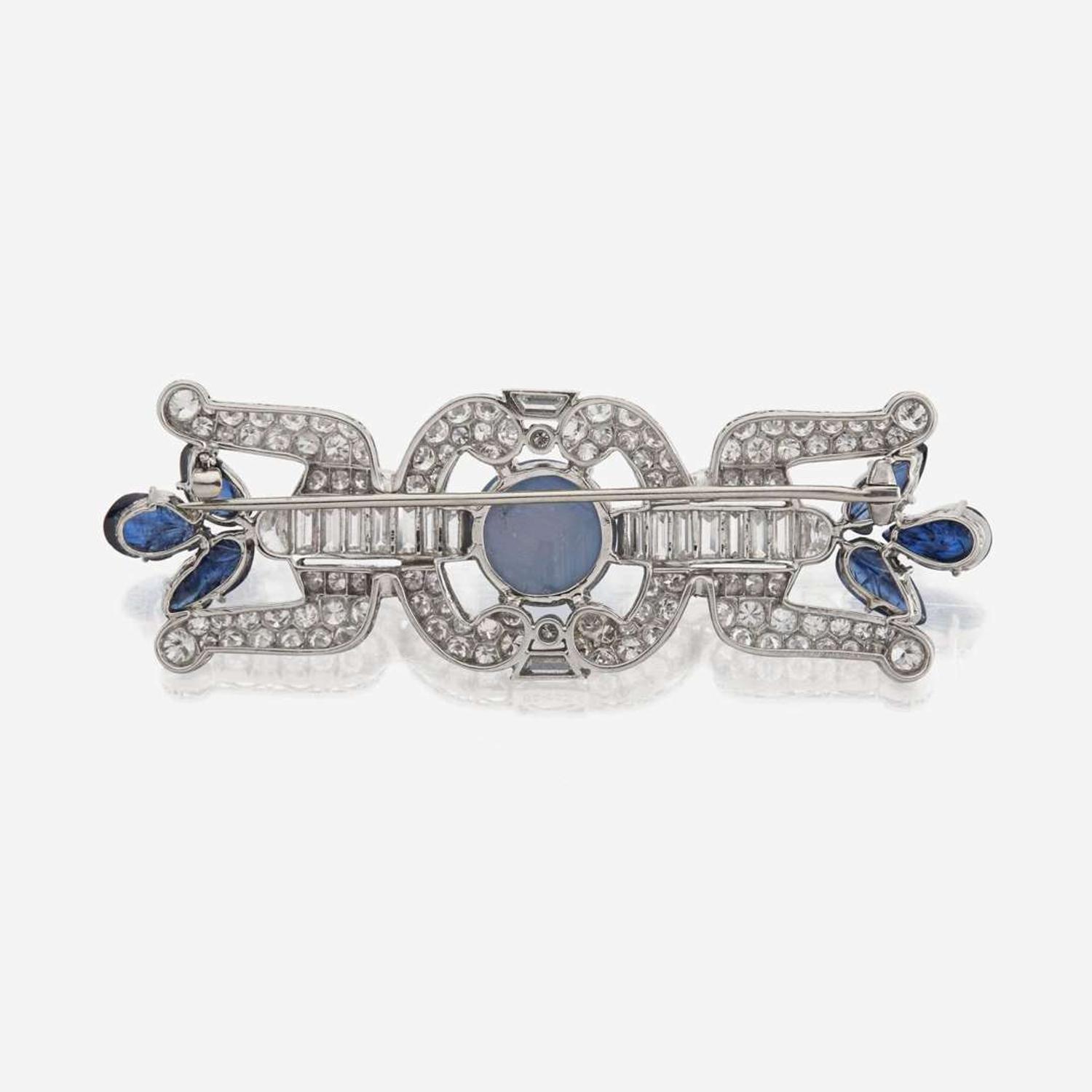 A star sapphire, sapphire, diamond, and platinum brooch, J.E. Caldwell & Co.