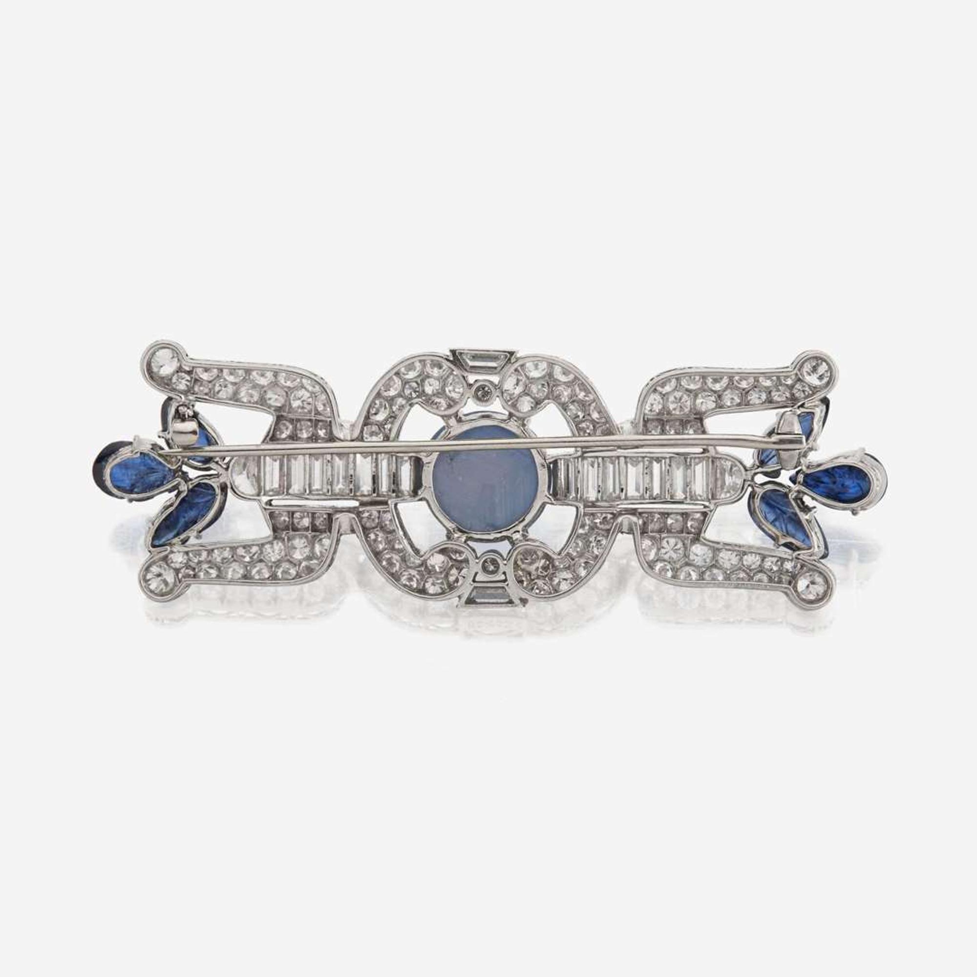 A star sapphire, sapphire, diamond, and platinum brooch, J.E. Caldwell & Co.