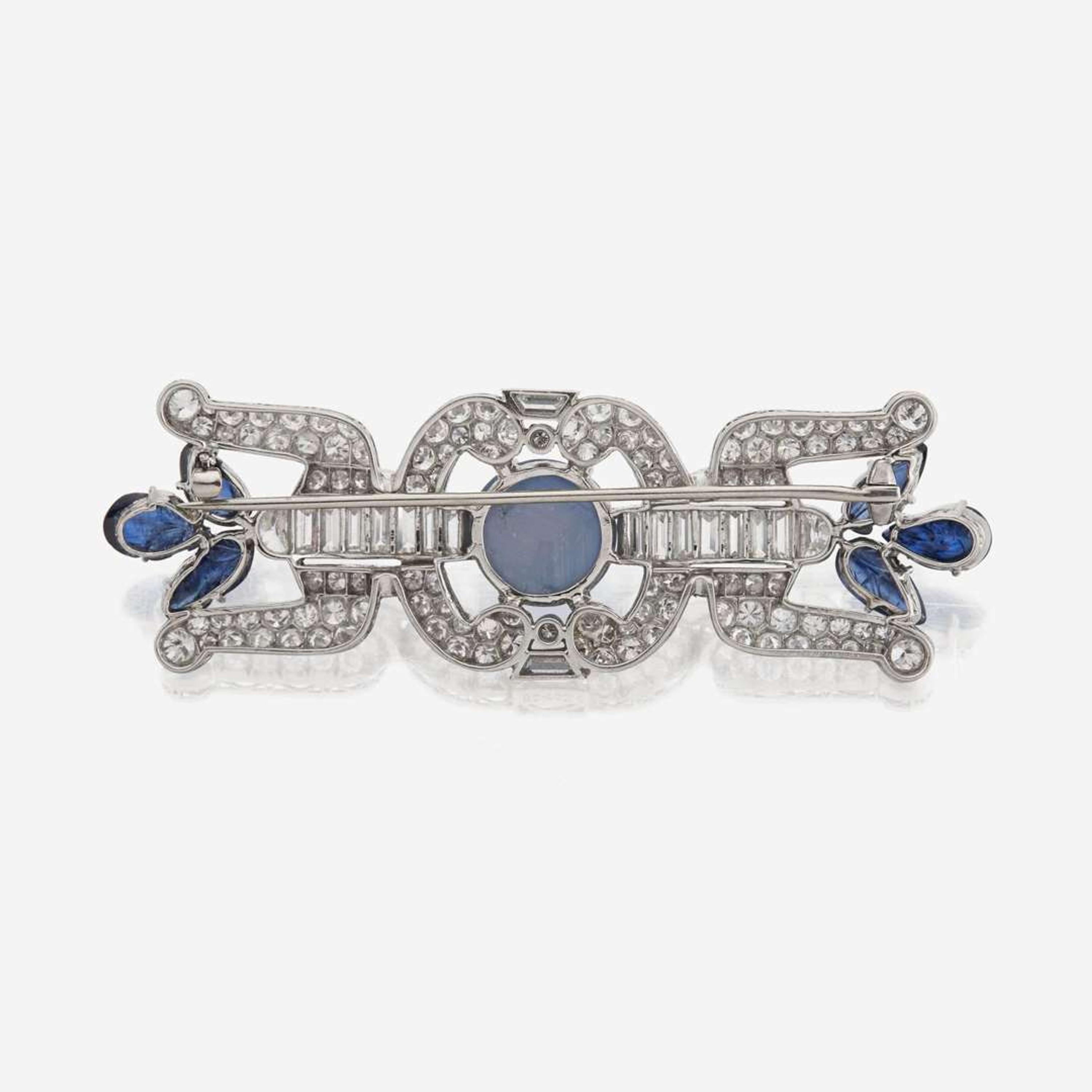 A star sapphire, sapphire, diamond, and platinum brooch, J.E. Caldwell & Co.
