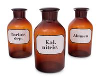 A Set of Three Large Amber Glass Apothecary Jars