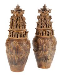 A Pair of Chinese Terra Cotta Covered Urns Height 44 inches.
