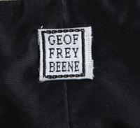 A Geoffrey Beene Black and Gold Jacket and Skirt Ensemble, Both size 8.