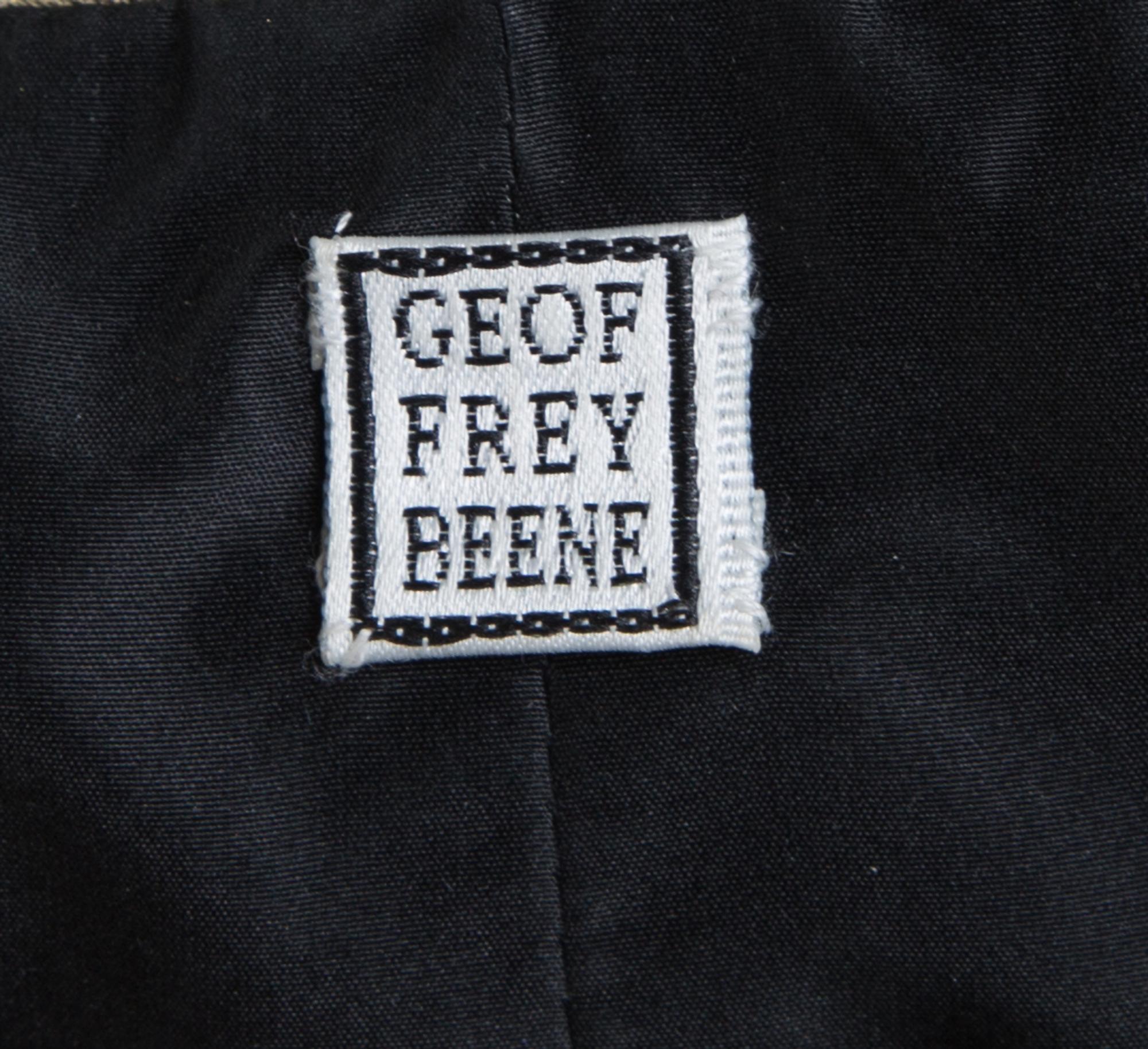 A Geoffrey Beene Black and Gold Jacket and Skirt Ensemble, Both size 8.