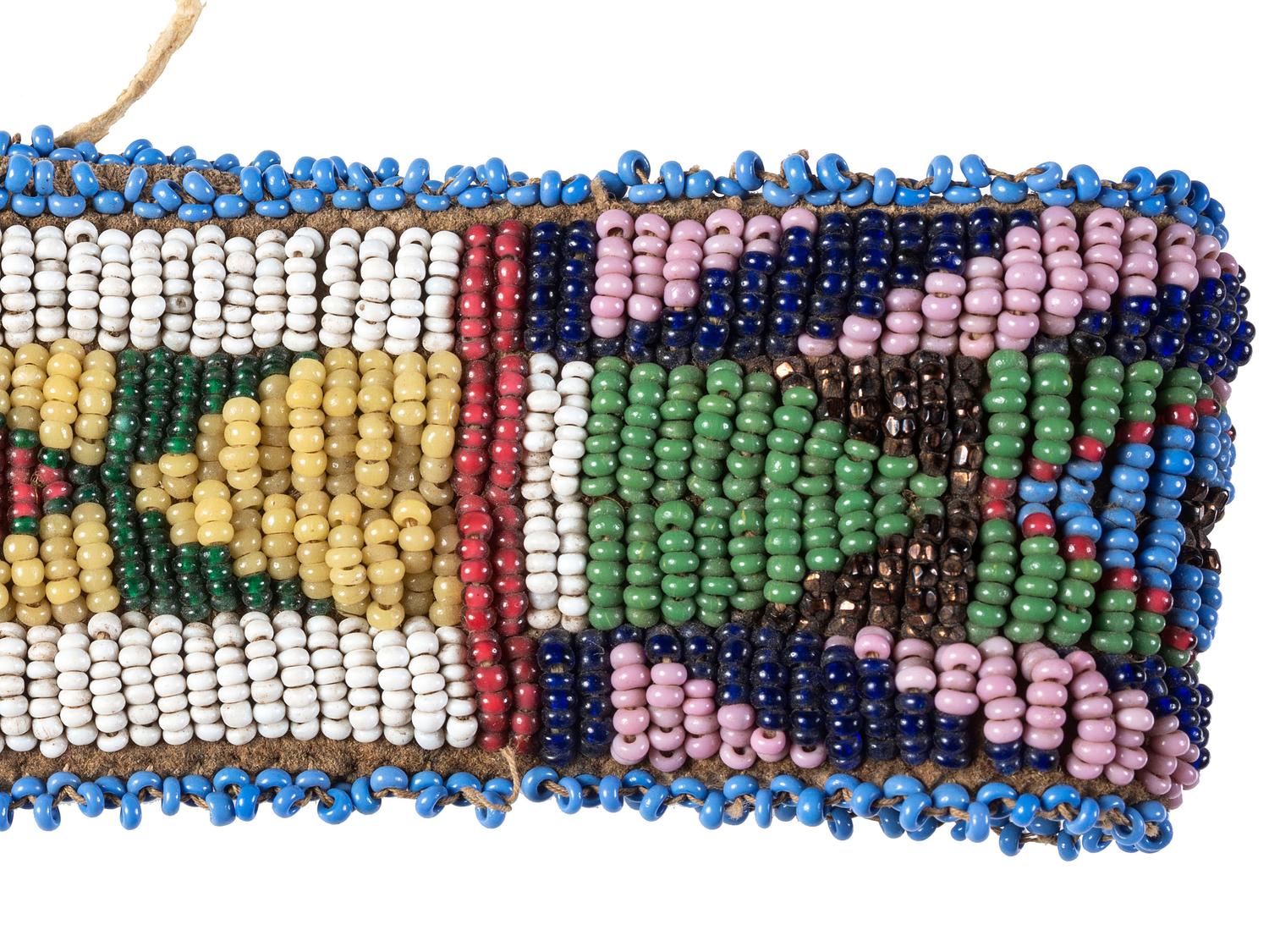 Sioux Beaded Hide Knife Sheath, Armbands, and Rattle