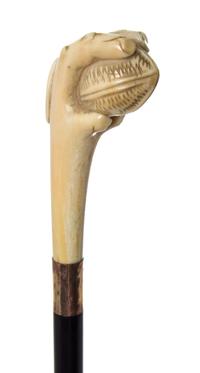 A Carved Walrus Ivory Cane, Length of handle 4 5/8 x length overall 37 1/8 inches.