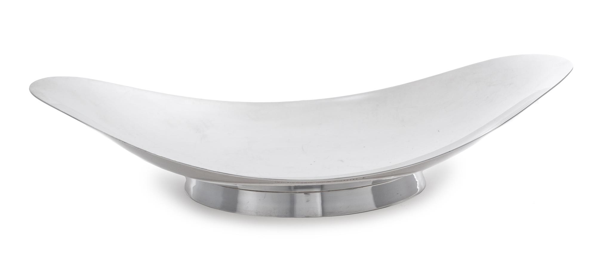 An American Silver Bowl, Tiffany & Co., New York, NY, of flared oval form and raised on a circular foot.
