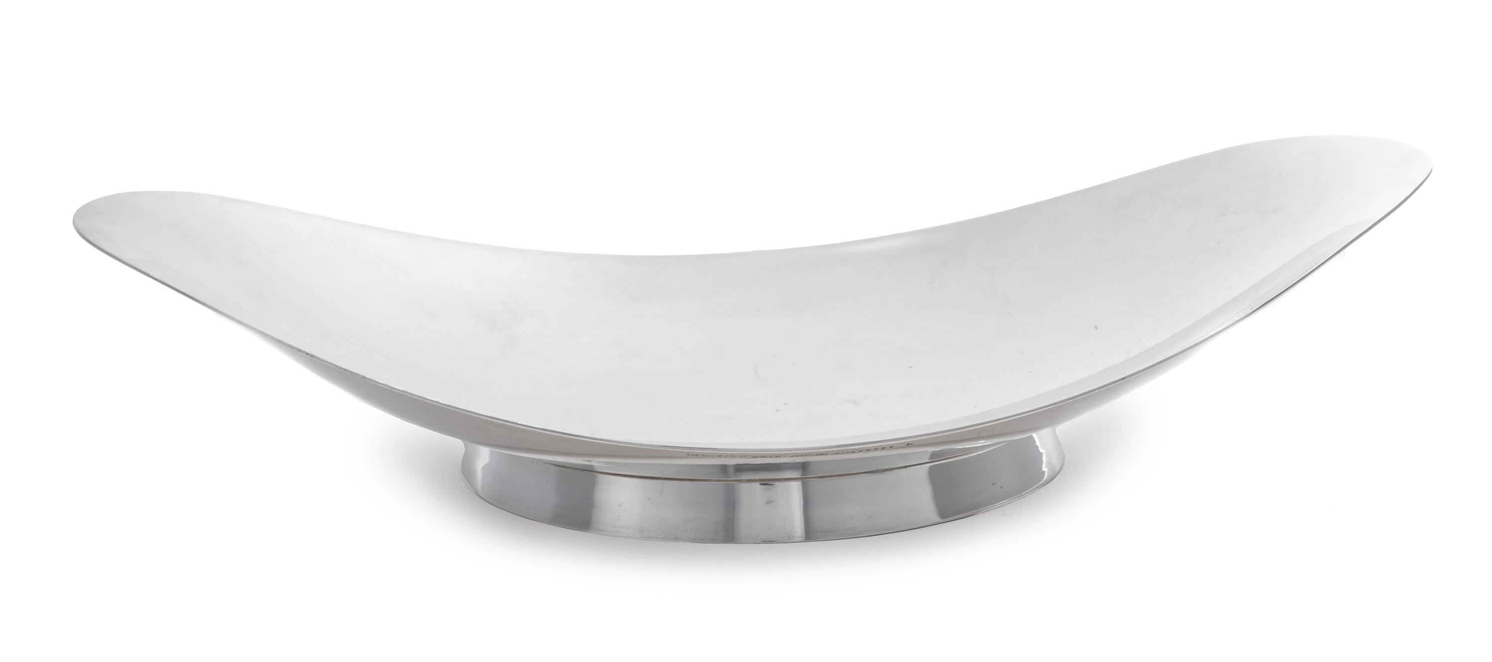 An American Silver Bowl, Tiffany & Co., New York, NY, of flared oval form and raised on a circular foot.
