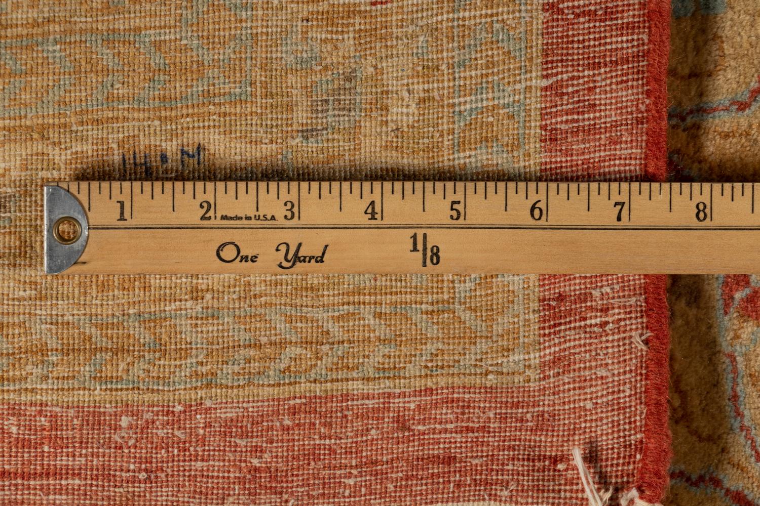 An Indo-Tabriz Wool Rug
