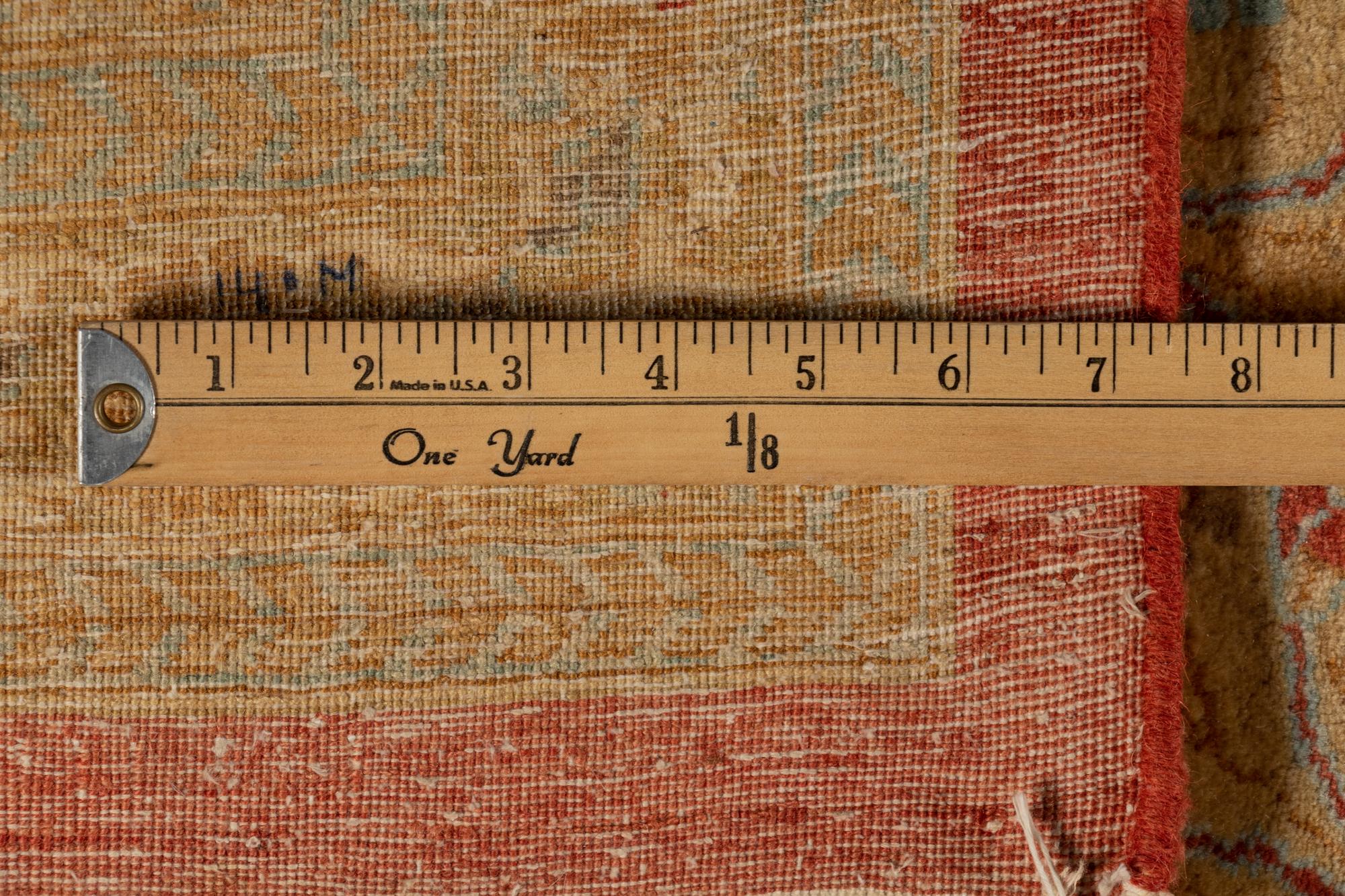 An Indo-Tabriz Wool Rug