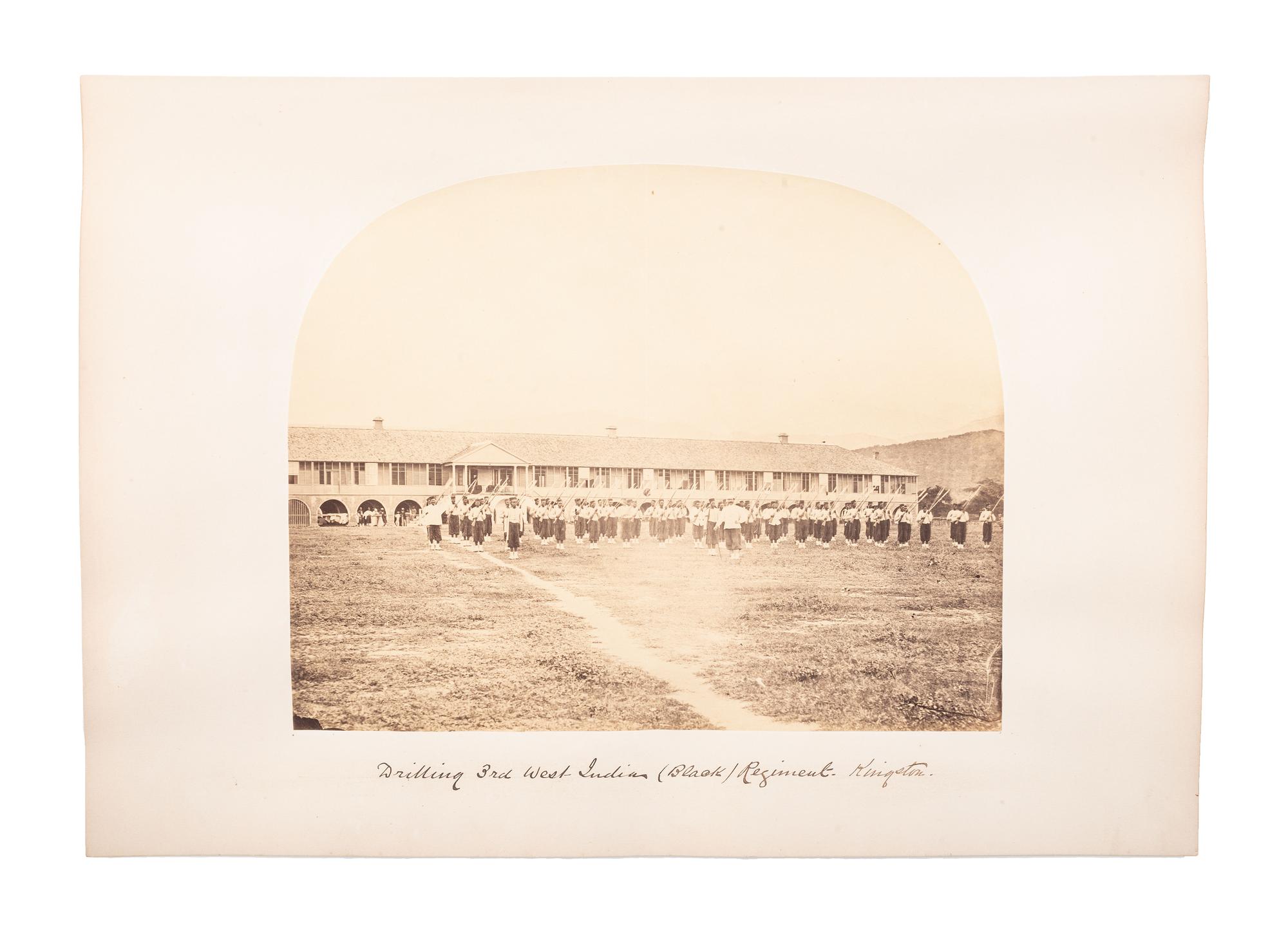 [EARLY PHOTOGRAPHY] -- [JAMAICA & UNITED STATES]. A group of 26 albumen photographs, some featuring Black subjects, incl. troops drilling in Kingston.