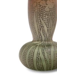 An Iridescent Glass Vase with Irises