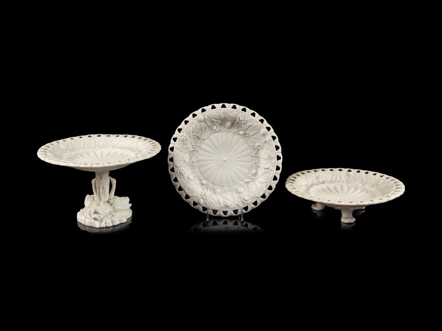 An English Pierced and Sunflower Decorated Bisque Porcelain Dessert Service