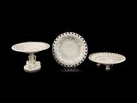 An English Pierced and Sunflower Decorated Bisque Porcelain Dessert Service